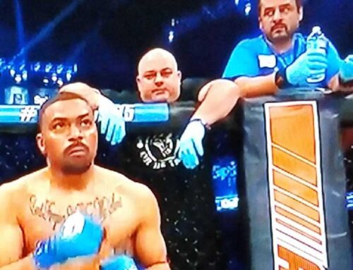 Aurora, Naperville, Channahon, and South Barrington Coach Jeff Neal and Steve Colon coaching Lloyd Carter at Bellator